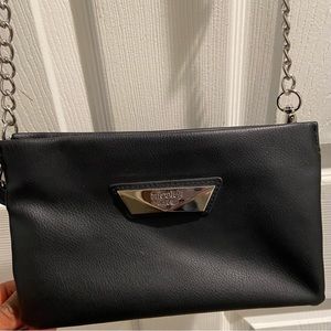 Faux leather crossbody bag with long silver chain